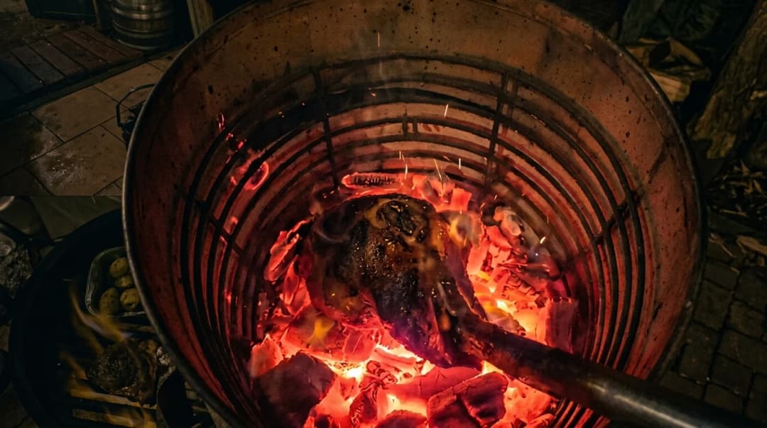 Caveman-style tomahawk in de kolen met chimichurri